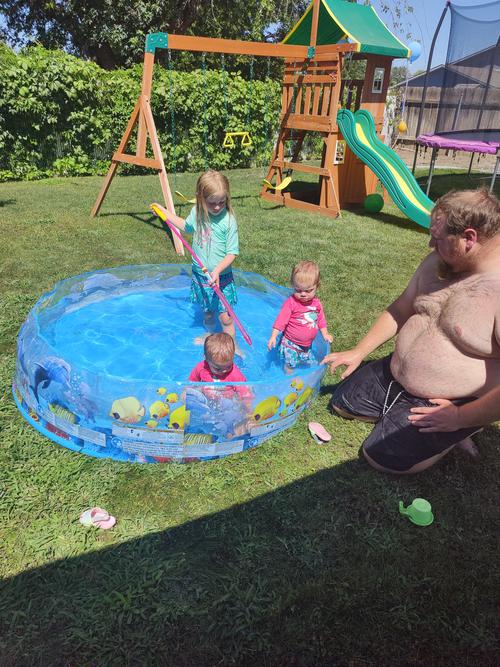 Playing in the kiddie pool at Daisy's birthday party